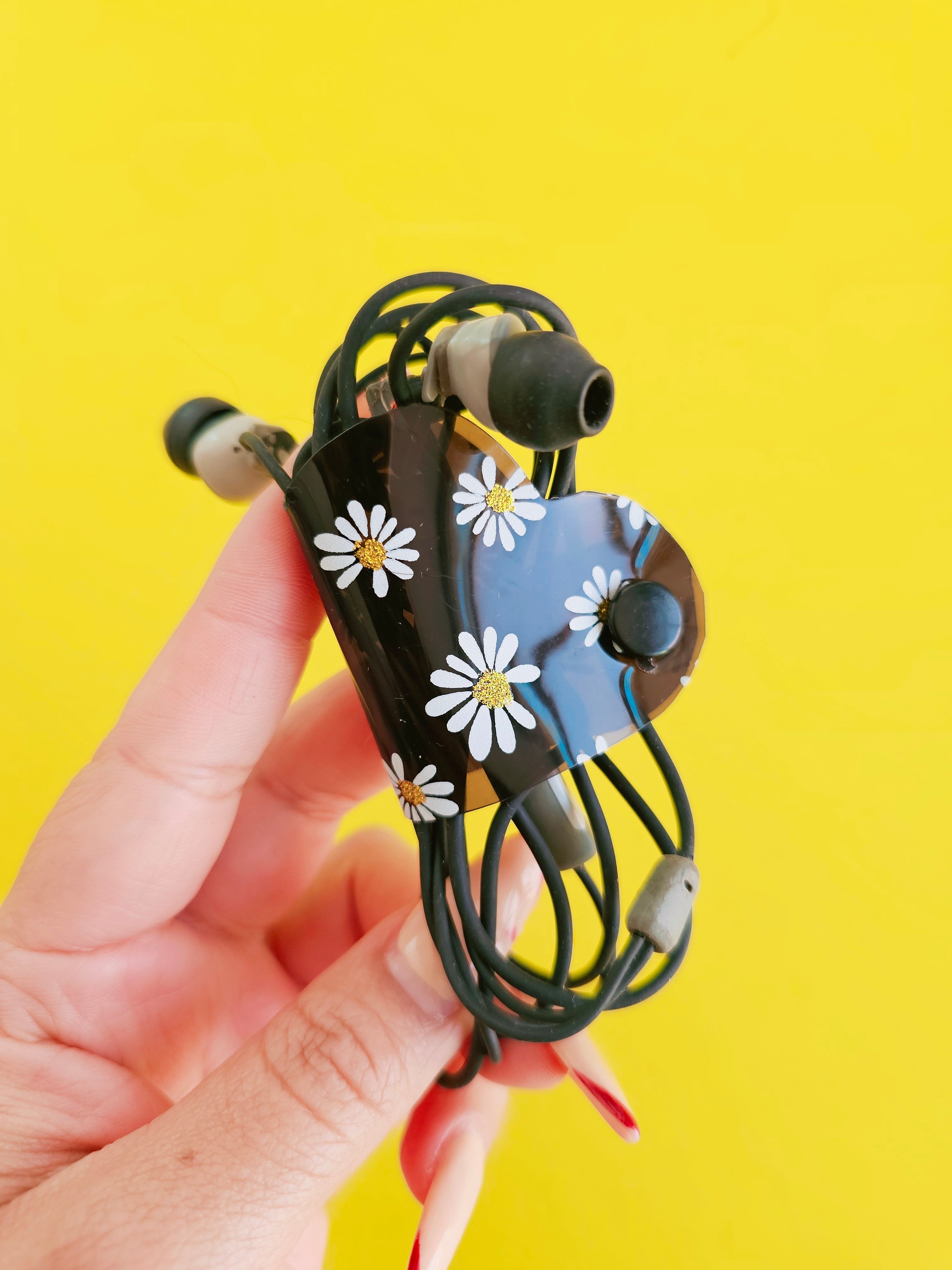 Clip de Cable CH Negro Margaritas