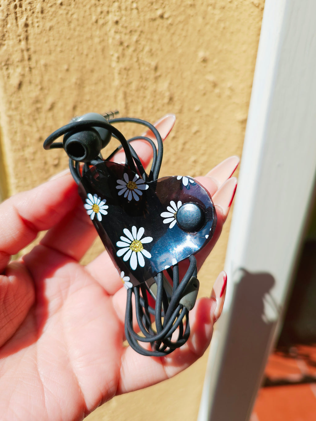 Clip de Cable CH Negro Margaritas