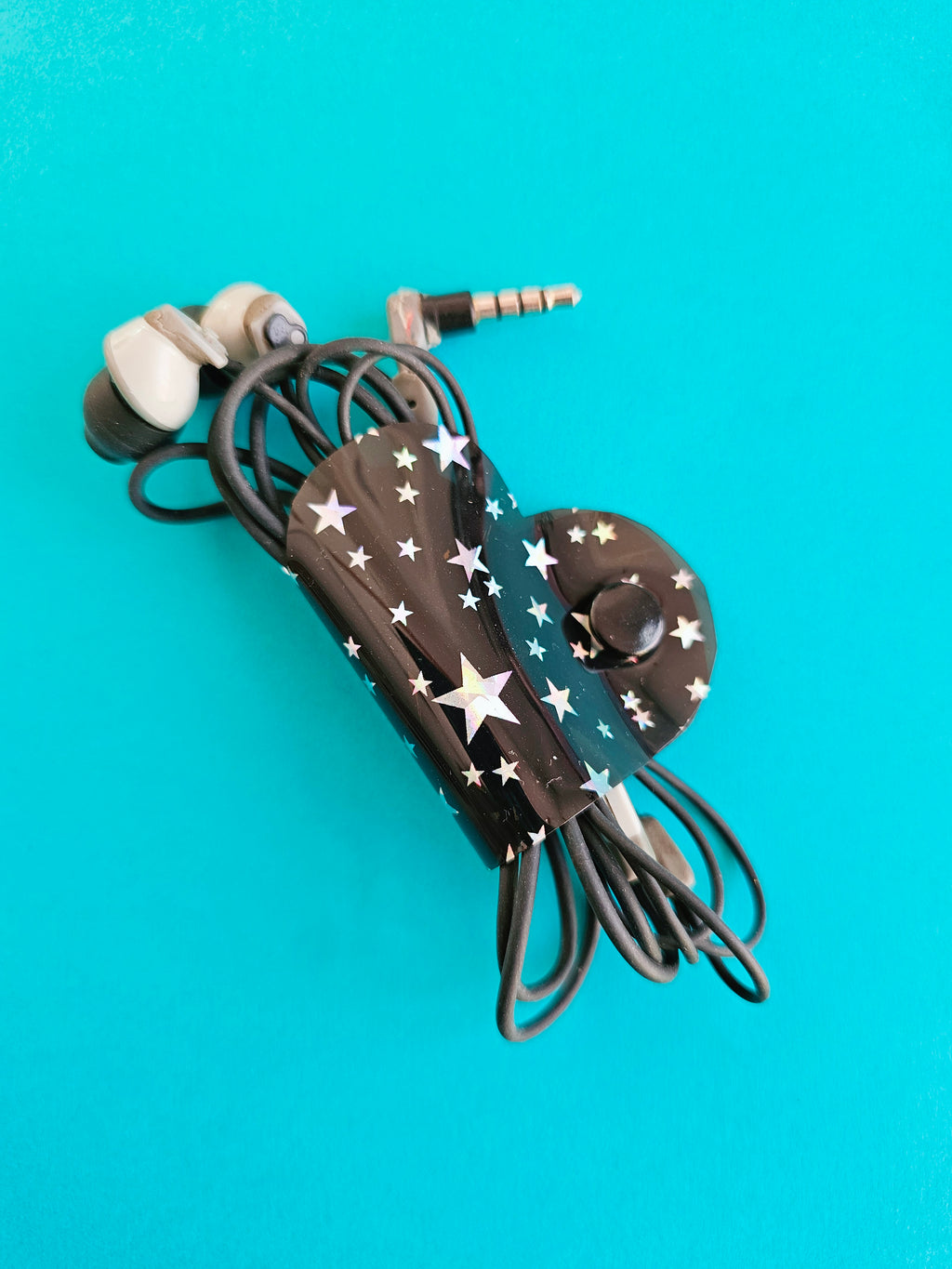 Clip de Cable CH Negro Estrellas