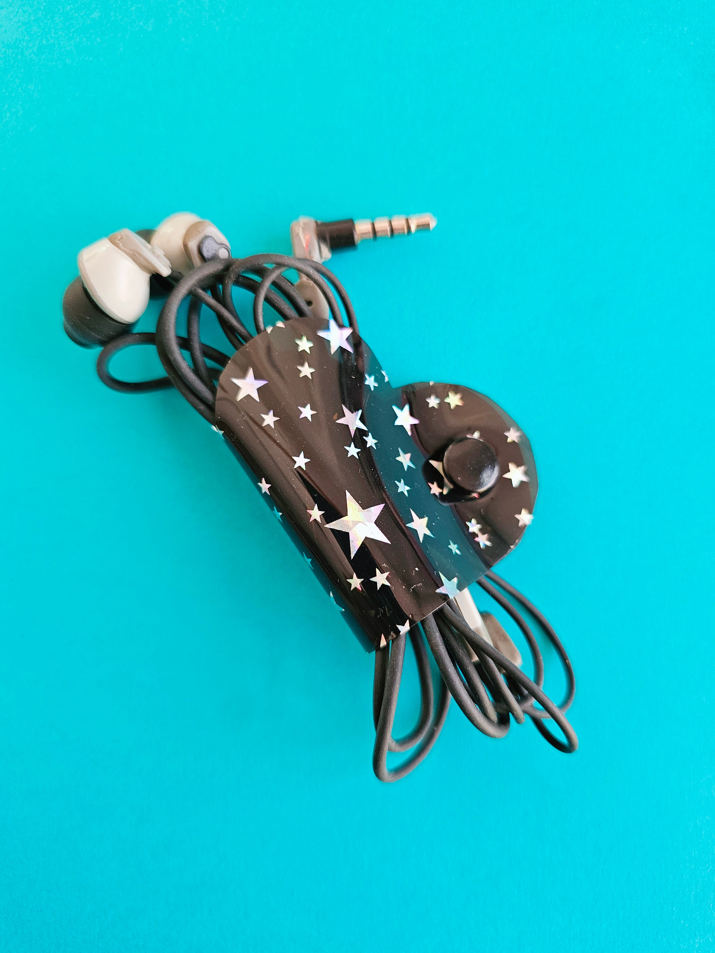 Clip de Cable CH Negro Estrellas
