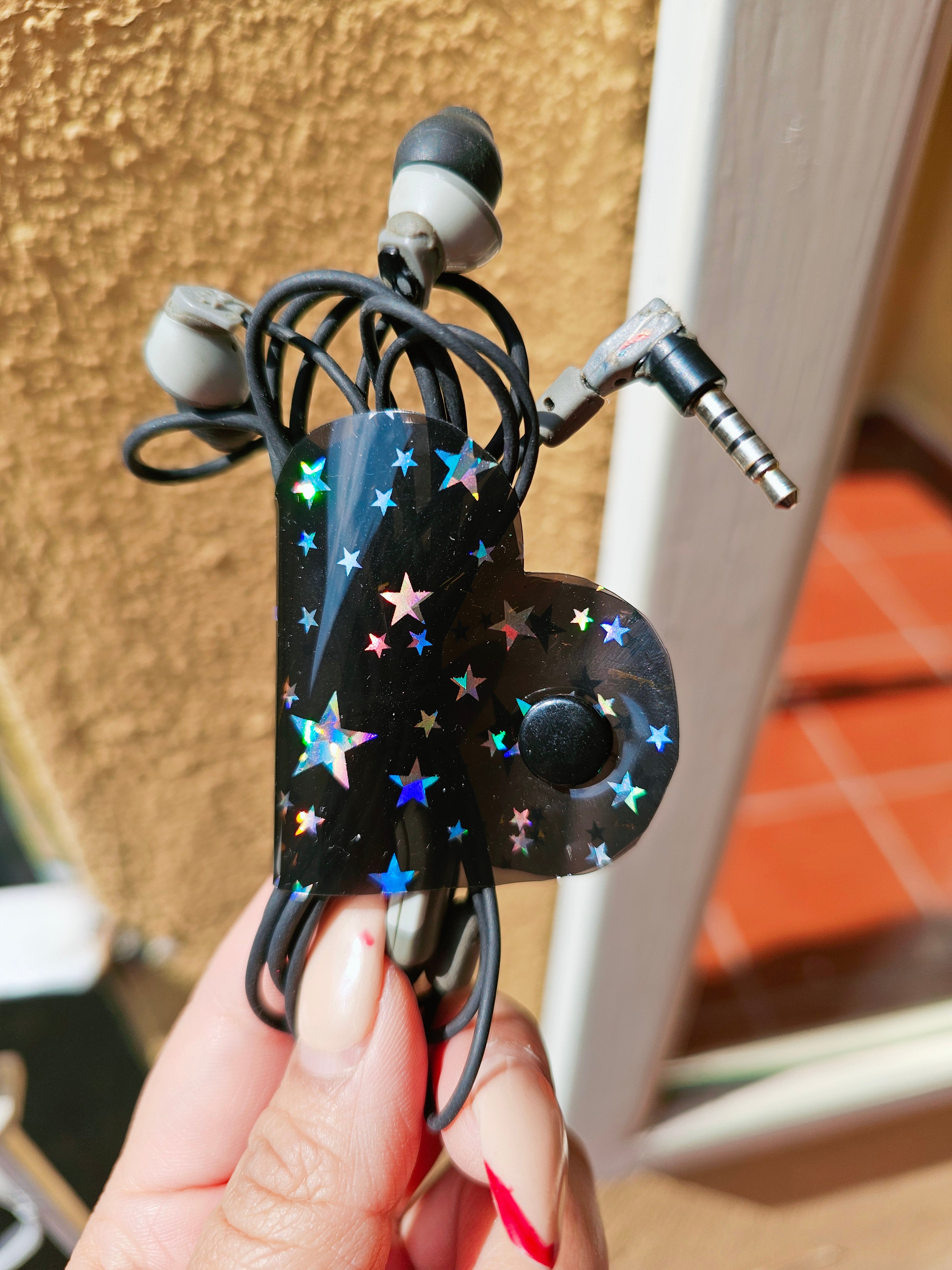 Clip de Cable CH Negro Estrellas