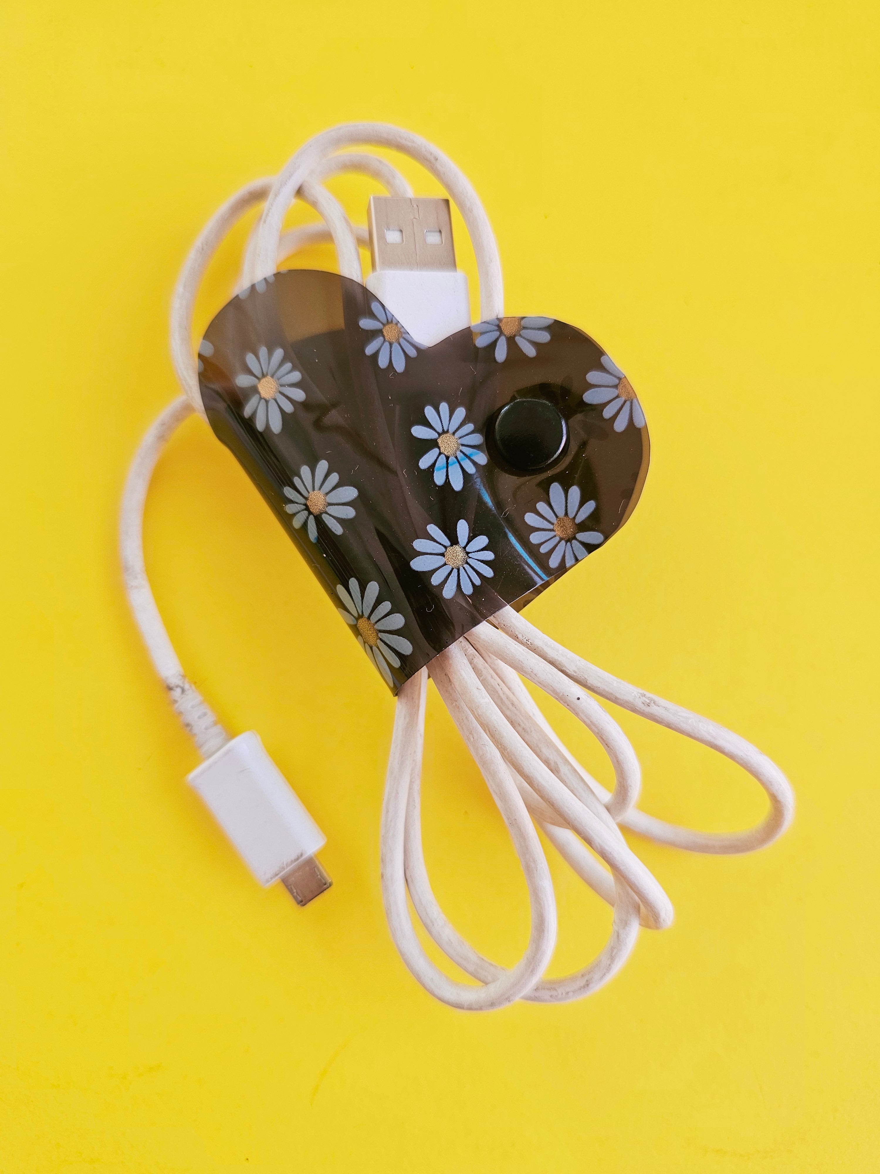 Clip de Cable GD Negro Margaritas