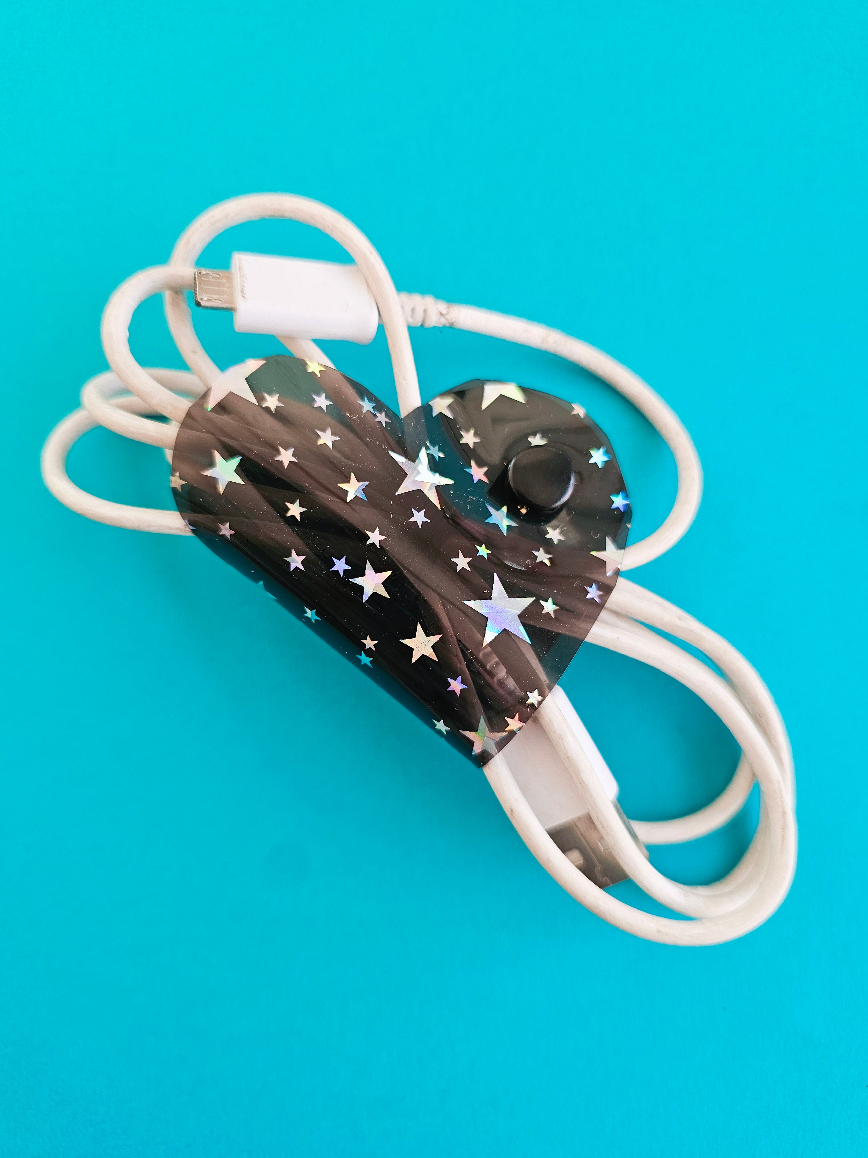 Clip de Cable GD Negro Estrellas