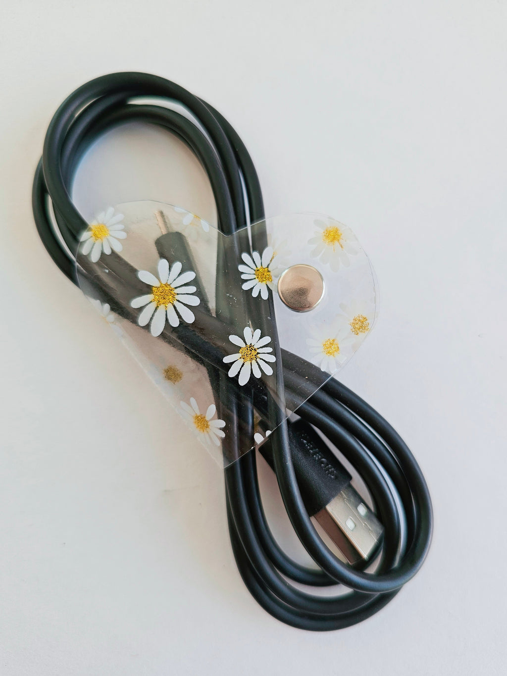 Clip de Cable GD Blanco Margaritas