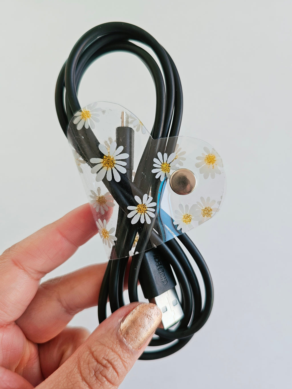 Clip de Cable GD Blanco Margaritas